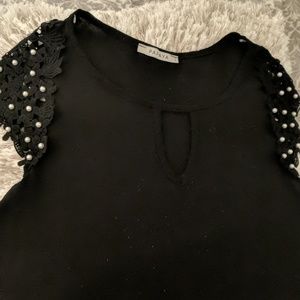 Black top with white beads